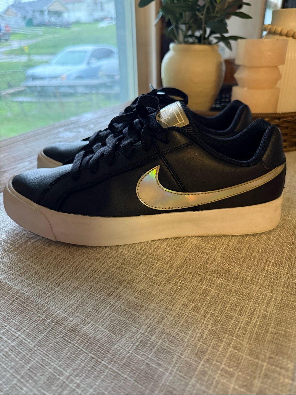 Nike women’s Black Sneakers with Iridescent Swoosh